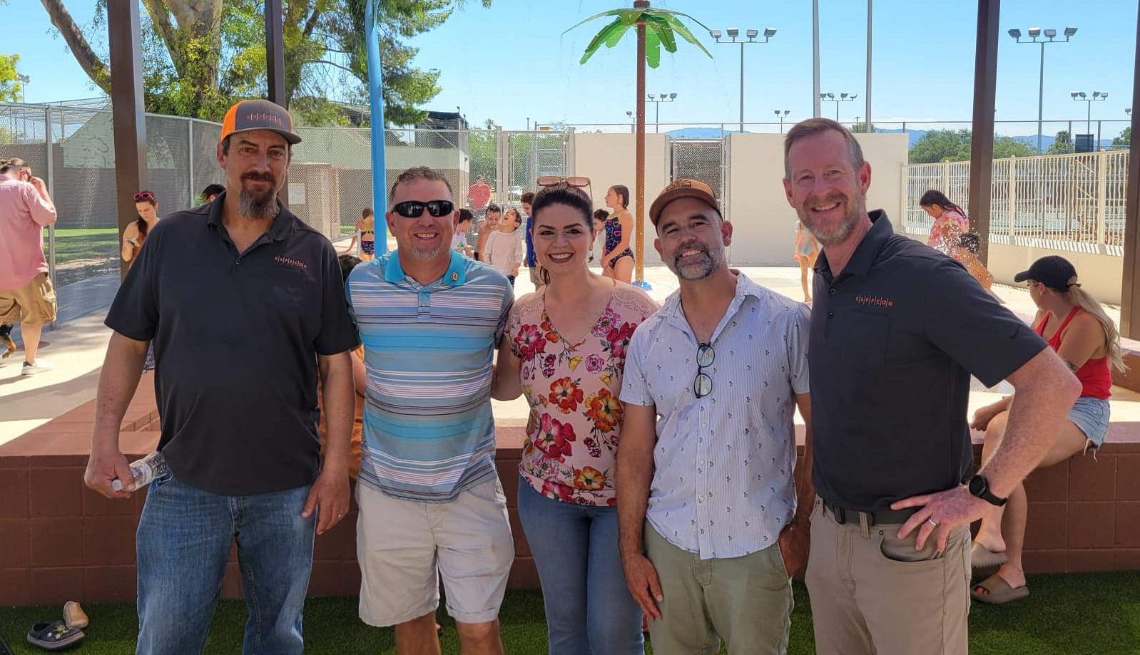 Paul at a splash pad opening with Mayor Regina Romero and Parks department contractors